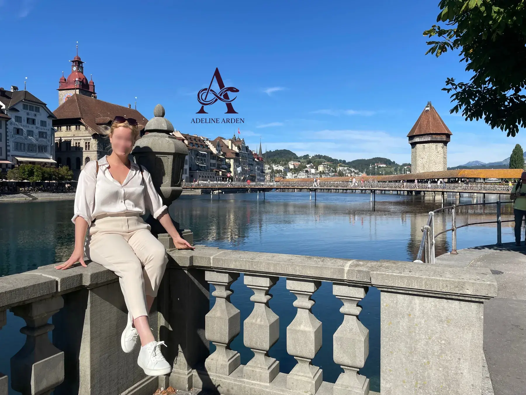 Adeline on a lakeside balustrade in Lucerne